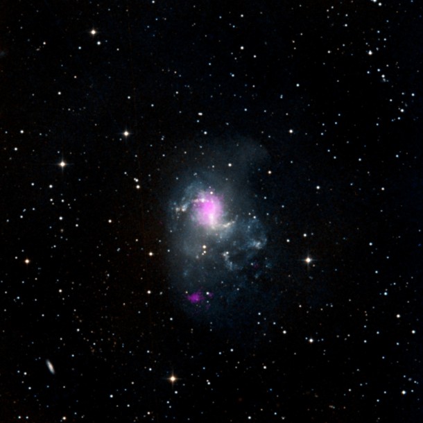 The magenta spots in this image show two black holes in the Circinus galaxy: the supermassive black hole at its heart, and a smaller one closer to the edge that belongs to a class called ultraluminous X-ray sources, or ULXs. Image credit: NASA/JPL-Caltech The magenta spots in this image show two black holes in the Circinus galaxy: the supermassive black hole at its heart, and a smaller one closer to the edge that belongs to a class called ultraluminous X-ray sources, or ULXs. Image credit: NASA/JPL-Caltech