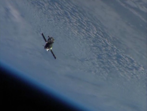 The Soyuz TMA-09M spacecraft backs away from the International Space Station shortly after undocking at 6:26 p.m. EST Sunday. Image Credit: NASA TV The Soyuz TMA-09M spacecraft backs away from the International Space Station shortly after undocking at 6:26 p.m. EST Sunday. Image Credit: NASA TV