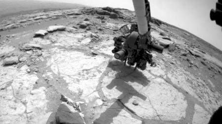 An image from the Curiosity rover's Front Hazard-Avoidance Camera shows the rover drilling into its second rock target, "Cumberland." Credit: NASA/JPL-Caltech An image from the Curiosity rover's Front Hazard-Avoidance Camera shows the rover drilling into its second rock target, "Cumberland." Credit: NASA/JPL-Caltech