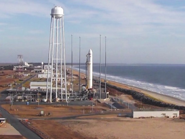 The Antares rocket carrying the Cygnus commercial resupply spacecraft rests at its launch pad at Wallops Flight Facility in Virginia. Image Credit: NASA TV The Antares rocket carrying the Cygnus commercial resupply spacecraft rests at its launch pad at Wallops Flight Facility in Virginia. Image Credit: NASA TV
