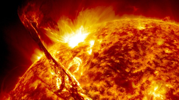 New research suggests that mysterious events known as fast radio bursts might come from nearby flaring stars, rather than more energetic events in the distant universe. This image of the Sun, from NASA's Solar Dynamics Observatory, shows a lower-energy example of the kind of event that could cause fast radio bursts. NASA New research suggests that mysterious events known as fast radio bursts might come from nearby flaring stars, rather than more energetic events in the distant universe. This image of the Sun, from NASA's Solar Dynamics Observatory, shows a lower-energy example of the kind of event that could cause fast radio bursts. NASA