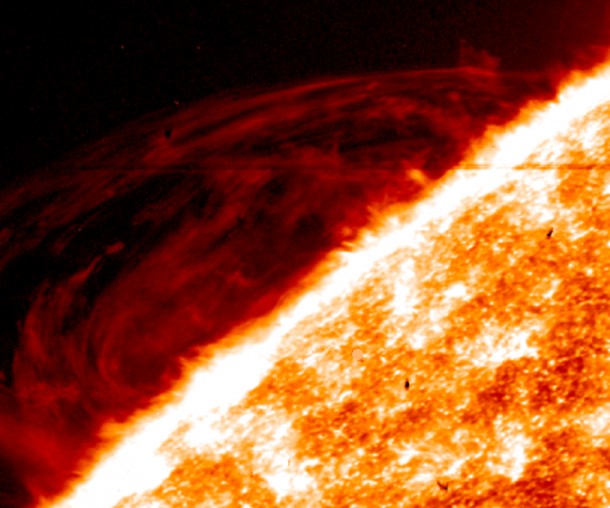The fine detail in images of prominences in the sun's atmosphere from NASA's Interface Region Imaging Spectrometer – such as the red swirls shown here – are challenging the way scientists understand such events. Image Credit: NASA/LMSAL/IRIS The fine detail in images of prominences in the sun's atmosphere from NASA's Interface Region Imaging Spectrometer – such as the red swirls shown here – are challenging the way scientists understand such events. Image Credit: NASA/LMSAL/IRIS