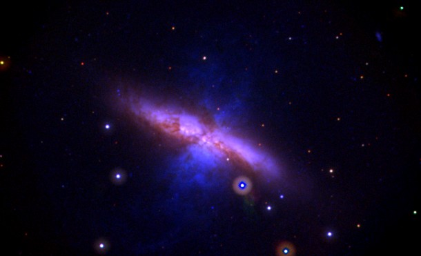 This Swift UVOT image shows M82 before the explosion and combines data acquired between 2007 and 2013. Mid-ultraviolet light is shown in blue, near-UV light in green, and visible light in red. The image is 17 arcminutes across, or slightly more than half the apparent diameter of a full moon. Credit: NASA/Swift/P. Brown, TAMU This Swift UVOT image shows M82 before the explosion and combines data acquired between 2007 and 2013. Mid-ultraviolet light is shown in blue, near-UV light in green, and visible light in red. The image is 17 arcminutes across, or slightly more than half the apparent diameter of a full moon. Credit: NASA/Swift/P. Brown, TAMU