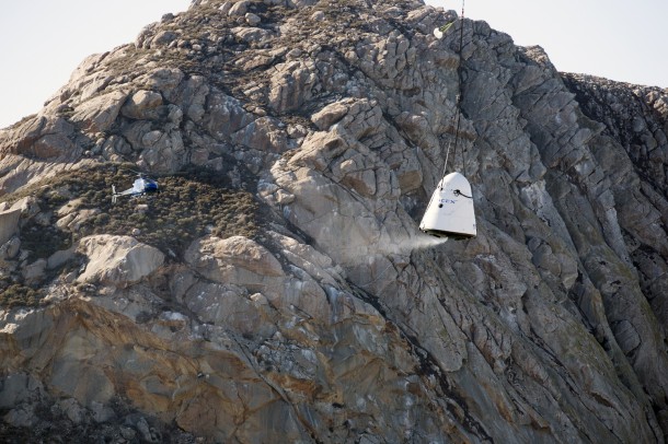 An Erickson Sky Crane helicopter returns the SpaceX Dragon test article to Morro Bay, Cailf., following a drop test to evaluate the spacecraft's parachute deployment system. The test was part of a milestone under its Commercial Crew Integrated Capability agreement with NASA's Commercial Crew Progra Image Credit: NASA/Kim Shiflett An Erickson Sky Crane helicopter returns the SpaceX Dragon test article to Morro Bay, Cailf., following a drop test to evaluate the spacecraft's parachute deployment system. The test was part of a milestone under its Commercial Crew Integrated Capability agreement with NASA's Commercial Crew Progra Image Credit: NASA/Kim Shiflett
