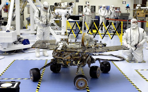 In the In the Kennedy Space Center's Payload Hazardous Servicing Facility, engineers and scientists test the Mars Exploration Rover-B, also known as Opportunity, for mobility and maneuverability on March 21, 2003. Image Credit: NASA In the In the Kennedy Space Center's Payload Hazardous Servicing Facility, engineers and scientists test the Mars Exploration Rover-B, also known as Opportunity, for mobility and maneuverability on March 21, 2003. Image Credit: NASA