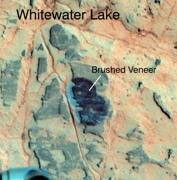 Researchers used NASA's Mars Exploration Rover Opportunity to find a water-related mineral on the ground that had been detected from orbit, and found it in the dark veneer of rocks on the rim of Endeavour Crater. Image Credit: NASA/JPL-Caltech/Cornell Univ./Arizona State Univ. Researchers used NASA's Mars Exploration Rover Opportunity to find a water-related mineral on the ground that had been detected from orbit, and found it in the dark veneer of rocks on the rim of Endeavour Crater. Image Credit: NASA/JPL-Caltech/Cornell Univ./Arizona State Univ.