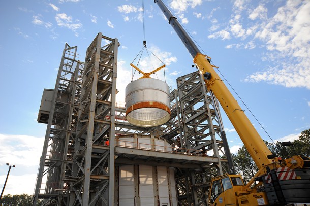 The test article stage adapter is lowered into a test stand in the East Test Area at NASA's Marshall Space Flight Center. Image Credit: NASA/MSFC/David Olive The test article stage adapter is lowered into a test stand in the East Test Area at NASA's Marshall Space Flight Center. Image Credit: NASA/MSFC/David Olive