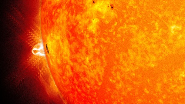A giant sunspot appeared on Feb. 25, 2014, for its third trip across the face of the sun. This blend of two images from NASA's Solar Dynamics Observatory shows the sunspot in visible light and an X-class flare observable in ultraviolet light. Image Credit: NASA/SDO/Goddard Space Flight Center A giant sunspot appeared on Feb. 25, 2014, for its third trip across the face of the sun. This blend of two images from NASA's Solar Dynamics Observatory shows the sunspot in visible light and an X-class flare observable in ultraviolet light. Image Credit: NASA/SDO/Goddard Space Flight Center