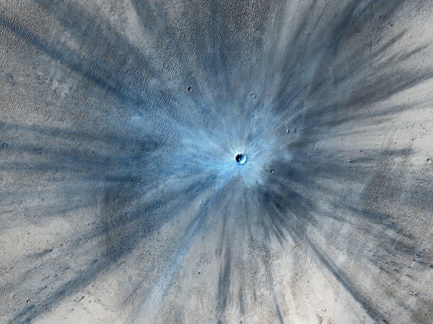 A dramatic, fresh impact crater dominates this image taken by the High Resolution Imaging Science Experiment (HiRISE) camera on NASA's Mars Reconnaissance Orbiter on Nov. 19, 2013. Image Credit: NASA/JPL-Caltech/Univ. of Arizona A dramatic, fresh impact crater dominates this image taken by the High Resolution Imaging Science Experiment (HiRISE) camera on NASA's Mars Reconnaissance Orbiter on Nov. 19, 2013. Image Credit: NASA/JPL-Caltech/Univ. of Arizona
