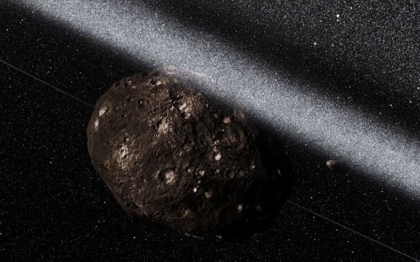 This artist’s impression shows the view from inside the ring system, with Chariklo behind and shepherding satellites also visible. Credit: ESO/L. Calçada/M. Kornmesser/Nick Risinger (skysurvey.org) This artist’s impression shows the view from inside the ring system, with Chariklo behind and shepherding satellites also visible. Credit: ESO/L. Calçada/M. Kornmesser/Nick Risinger (skysurvey.org)