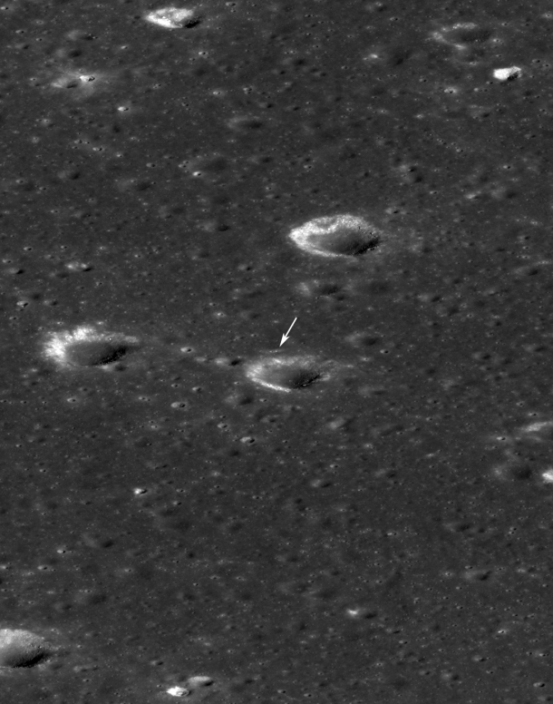 LRO slewed 54 degrees to the east on Feb. 16, 2014, to allow the LROC instrument to snap a dramatic oblique view of the Chang'e 3 site (arrow). Crater in front of lander is 450 meters (about 1,476 feet) in diameter. Image width is 2,900 meters (about 9,500 feet) at the center. Image Credit: NASA/Goddard/Arizona State University LRO slewed 54 degrees to the east on Feb. 16, 2014, to allow the LROC instrument to snap a dramatic oblique view of the Chang'e 3 site (arrow). Crater in front of lander is 450 meters (about 1,476 feet) in diameter. Image width is 2,900 meters (about 9,500 feet) at the center. Image Credit: NASA/Goddard/Arizona State University