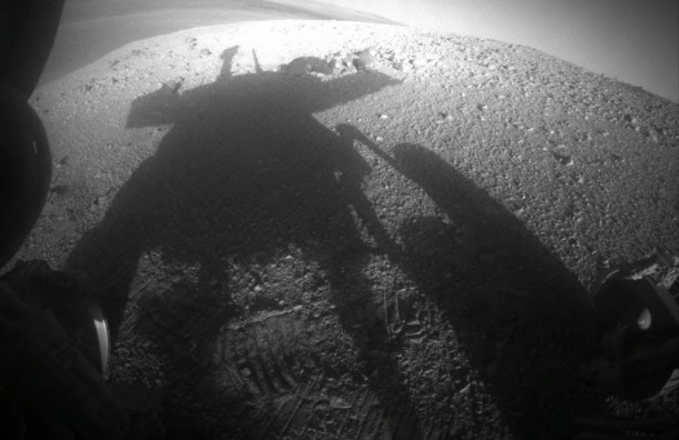 NASA's Mars Exploration Rover Opportunity caught its own silhouette in this late-afternoon image taken by the rover's rear hazard avoidance camera on March 20, 2014. Image Credit: NASA/JPL-Caltech NASA's Mars Exploration Rover Opportunity caught its own silhouette in this late-afternoon image taken by the rover's rear hazard avoidance camera on March 20, 2014. Image Credit: NASA/JPL-Caltech