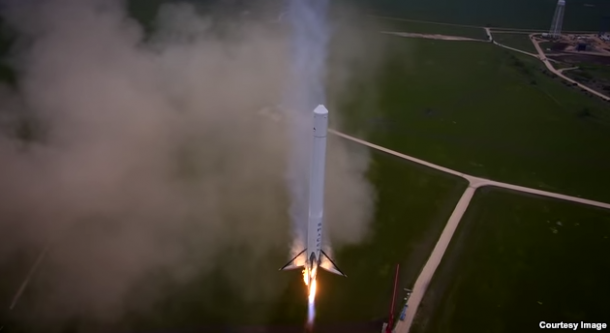 The Falcon 9 Reusable descends slowly back to the launch pad in a still from a video released by SpaceX. The Falcon 9 Reusable descends slowly back to the launch pad in a still from a video released by SpaceX.