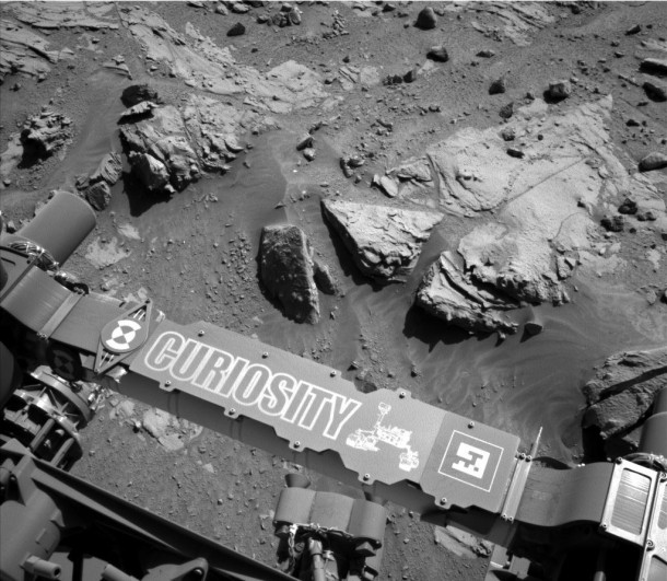 This image from the Navigation Camera on NASA's Curiosity Mars rover shows a sandstone slab on which the rover team has selected a target, "Windjana," for close-up examination. The target is on the approximately 2-foot-wide rock seen in the right half of this April 23, 2014, view. Credit: NASA/JPL-Caltech This image from the Navigation Camera on NASA's Curiosity Mars rover shows a sandstone slab on which the rover team has selected a target, "Windjana," for close-up examination. The target is on the approximately 2-foot-wide rock seen in the right half of this April 23, 2014, view. Credit: NASA/JPL-Caltech