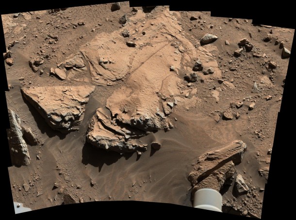 NASA's Curiosity Mars rover has driven within robotic-arm's reach of the sandstone slab at the center of this April 23 view from the rover's Mast Camera. The rover team plans to have Curiosity examine a target patch on the rock, called "Windjana," to aid a decision about whether to drill there. Credit: NASA/JPL-Caltech/MSSS NASA's Curiosity Mars rover has driven within robotic-arm's reach of the sandstone slab at the center of this April 23 view from the rover's Mast Camera. The rover team plans to have Curiosity examine a target patch on the rock, called "Windjana," to aid a decision about whether to drill there. Credit: NASA/JPL-Caltech/MSSS