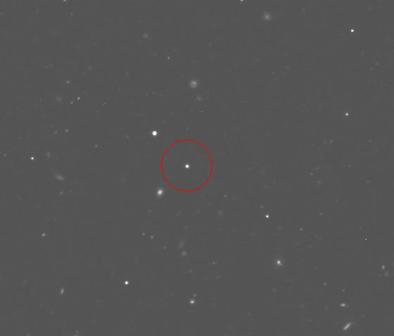 The runaway star cluster HVGC-1 (circled) in a photo from the Canada-France-Hawaii Telescope (CFHT). The cluster is zooming toward us at a speed of more than two million miles per hour. CFHT The runaway star cluster HVGC-1 (circled) in a photo from the Canada-France-Hawaii Telescope (CFHT). The cluster is zooming toward us at a speed of more than two million miles per hour. CFHT