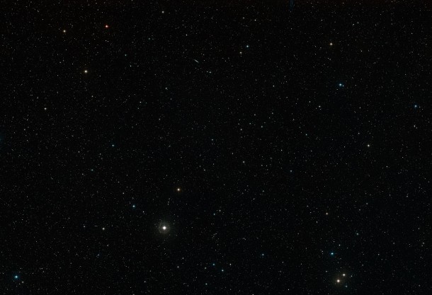 This Digitized Sky Survey (DSS) image was taken with a ground based telescope and shows the region surrounding a galaxy cluster called CLASS B1608+656. Credit: NASA & ESA, Digitised Sky Survey 2, N. Risinger (Skysurvey.org) This Digitized Sky Survey (DSS) image was taken with a ground based telescope and shows the region surrounding a galaxy cluster called CLASS B1608+656. Credit: NASA & ESA, Digitised Sky Survey 2, N. Risinger (Skysurvey.org)