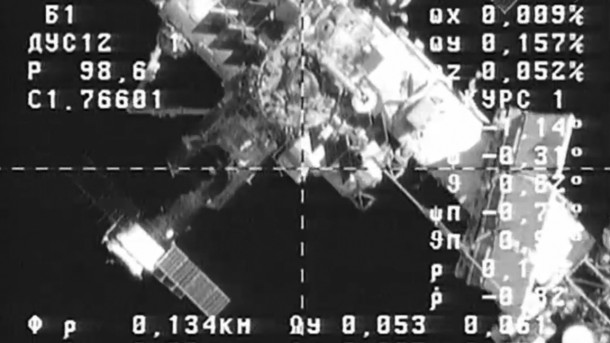 The International Space Station is viewed from cameras on the ISS Progress 53 during its final approach before redocking to the Zvezda service module. Image Credit: NASA TV The International Space Station is viewed from cameras on the ISS Progress 53 during its final approach before redocking to the Zvezda service module. Image Credit: NASA TV
