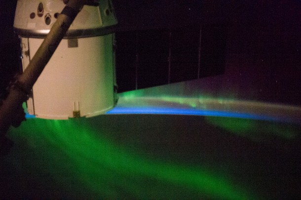 A wish-bone shaped display of Aurora Australis over the Indian Ocean serves as a very colorful backdrop for the SpaceX Dragon spacecraft which is berthed to the International Space Station. Image Credit: NASA A wish-bone shaped display of Aurora Australis over the Indian Ocean serves as a very colorful backdrop for the SpaceX Dragon spacecraft which is berthed to the International Space Station. Image Credit: NASA