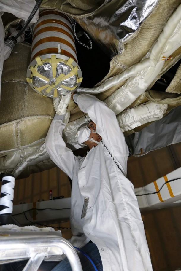 An engineer works on the Parachute Deployment Device of the Low Density Supersonic Decelerator test vehicle in this image taken at the Missile Assembly Building at the US Navy's Pacific Missile Range Facility in Kaua'i, Hawaii. NASA/JPL-Caltech An engineer works on the Parachute Deployment Device of the Low Density Supersonic Decelerator test vehicle in this image taken at the Missile Assembly Building at the US Navy's Pacific Missile Range Facility in Kaua'i, Hawaii. NASA/JPL-Caltech