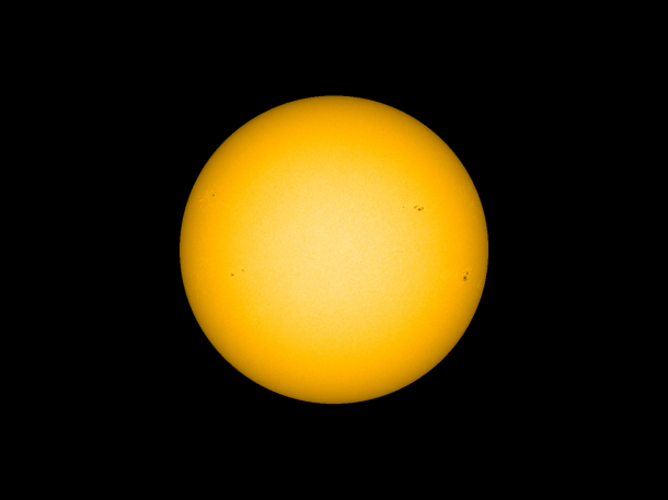 An image of the sun's surface, or photosphere, at 1:48 p.m. EDT on March 29, 2014, captured by the Helioseismic Magnetic Imager on NASA's Solar Dynamics Observatory. Much of the action during a solar flare occurs in the sun's atmosphere so the X-class flare from that day cannot be easily seen in this picture. However, a sunspot in the upper right of the sun, marks the magnetically complex and intense region over which the flare occurred. Credit: NASA/SDO/HMI An image of the sun's surface, or photosphere, at 1:48 p.m. EDT on March 29, 2014, captured by the Helioseismic Magnetic Imager on NASA's Solar Dynamics Observatory. Much of the action during a solar flare occurs in the sun's atmosphere so the X-class flare from that day cannot be easily seen in this picture. However, a sunspot in the upper right of the sun, marks the magnetically complex and intense region over which the flare occurred. Credit: NASA/SDO/HMI