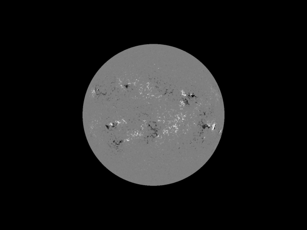 NASA's Solar Dynamics Observatory captures magnetic information about the surface of the sun. Dark areas in this image from 1:48 p.m. EDT on March 29, 2014, show where magnetic field lines point into the surface during the X-class flare. The white areas show where the field lines point out. This information helps unravel the complex magnetic system on and around the sun, which can lead to large eruptive events like solar flares. Credit: NASA/SDO/HMI NASA's Solar Dynamics Observatory captures magnetic information about the surface of the sun. Dark areas in this image from 1:48 p.m. EDT on March 29, 2014, show where magnetic field lines point into the surface during the X-class flare. The white areas show where the field lines point out. This information helps unravel the complex magnetic system on and around the sun, which can lead to large eruptive events like solar flares. Credit: NASA/SDO/HMI