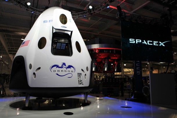 SpaceX unveiled its Dragon V2 spacecraft designed to carry humans into orbit. The company's founder and CEO, Elon Musk, detailed aspects of the design that was developed in partnership with NASA's Commercial Crew Program. Image Credit: NASA/Dmitri Gerondidakis SpaceX unveiled its Dragon V2 spacecraft designed to carry humans into orbit. The company's founder and CEO, Elon Musk, detailed aspects of the design that was developed in partnership with NASA's Commercial Crew Program. Image Credit: NASA/Dmitri Gerondidakis