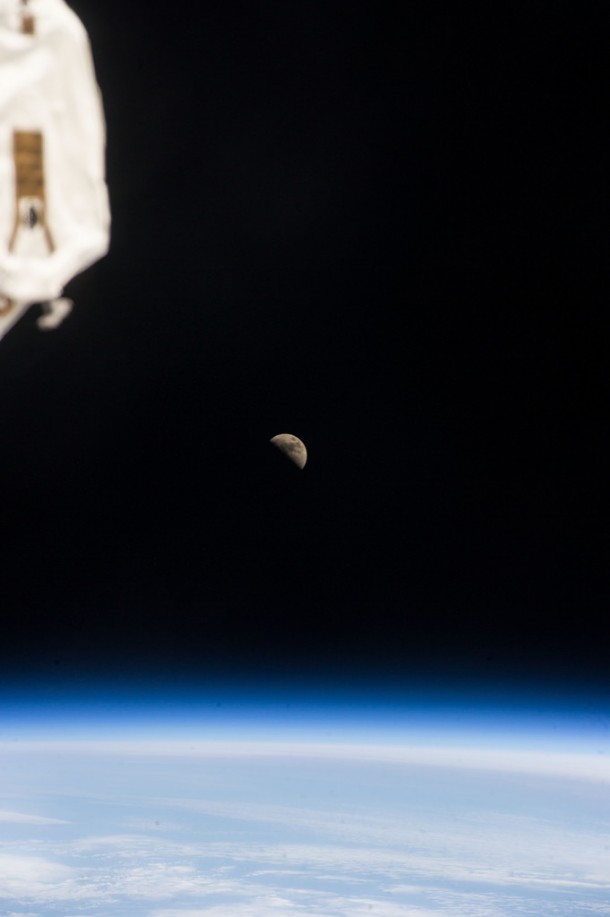 One of the crew members aboard the International Space Station photographed a half moon above Earth's horizon on May 6, 2014. Image Credit: NASA One of the crew members aboard the International Space Station photographed a half moon above Earth's horizon on May 6, 2014. Image Credit: NASA