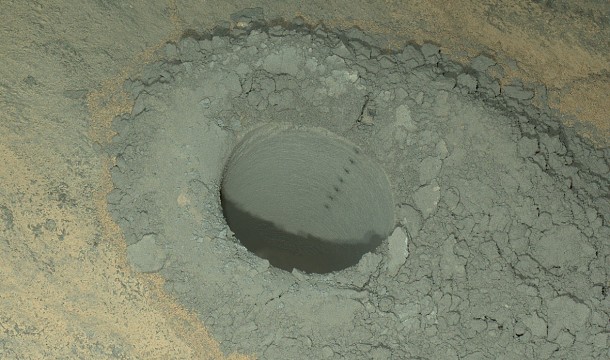 The Mars Hand Lens Imager on NASA's Curiosity Mars rover provided this nighttime view of a hole produced by the rover's drill and, inside the hole, a line of scars produced by the rover's rock-zapping laser. The camera used its own white-light LEDs to illuminate the scene on May 13, 2014. Image Credit: NASA/JPL-Caltech/MSSS The Mars Hand Lens Imager on NASA's Curiosity Mars rover provided this nighttime view of a hole produced by the rover's drill and, inside the hole, a line of scars produced by the rover's rock-zapping laser. The camera used its own white-light LEDs to illuminate the scene on May 13, 2014. Image Credit: NASA/JPL-Caltech/MSSS