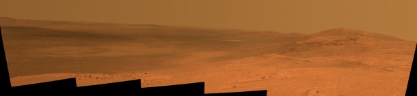 This vista of the Endeavour Crater rim was acquired by NASA's Mars Exploration Rover Opportunity's panoramic camera on April 18, 2014, from the southern end of "Murray Ridge" on the western rim of the crater. In mid-May, the rover approached the dark outcrops on the flank of the hill at right. Image Credit: NASA/JPL-Caltech/Cornell Univ./Arizona State Univ. This vista of the Endeavour Crater rim was acquired by NASA's Mars Exploration Rover Opportunity's panoramic camera on April 18, 2014, from the southern end of "Murray Ridge" on the western rim of the crater. In mid-May, the rover approached the dark outcrops on the flank of the hill at right. Image Credit: NASA/JPL-Caltech/Cornell Univ./Arizona State Univ.