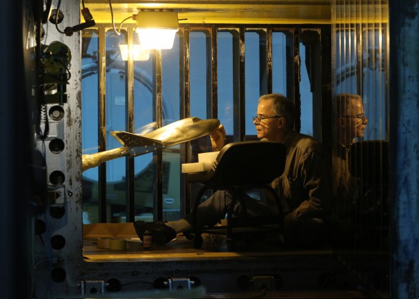 NASA technician Ricky Hall prepares a scale model of Sierra Nevada Corporation's Dream Chaser spacecraft for tests inside the Unitary Plan wind tunnel at NASA's Langley Research Center in Hampton, Virginia. Image Credit: NASA/David C. Bowman NASA technician Ricky Hall prepares a scale model of Sierra Nevada Corporation's Dream Chaser spacecraft for tests inside the Unitary Plan wind tunnel at NASA's Langley Research Center in Hampton, Virginia. Image Credit: NASA/David C. Bowman