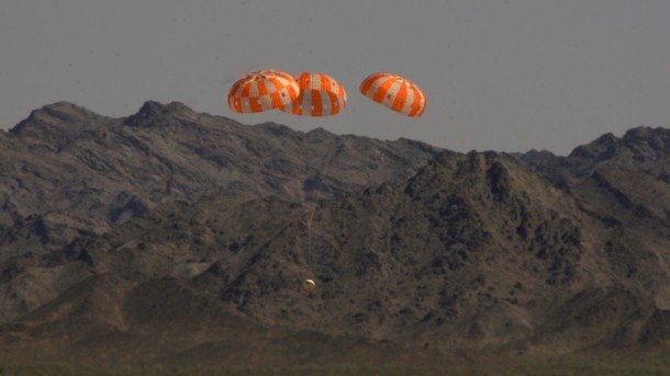 A test version of NASA’s Orion spacecraft descends under its three main parachutes above the U.S. Army Proving Ground in Arizona in the agency’s most difficult test of the parachutes system’s performance. NASA is preparing Orion for its first trip to space in December, a two-hour, four-orbit flight that will send an uncrewed spacecraft more than 3,600 miles into space before returning it to Earth to test the performance of many of the spacecraft’s critical systems needed to carry crew to deep space destinations in the future. Image Credit: NASA/Rad Sinyak A test version of NASA’s Orion spacecraft descends under its three main parachutes above the U.S. Army Proving Ground in Arizona in the agency’s most difficult test of the parachutes system’s performance. NASA is preparing Orion for its first trip to space in December, a two-hour, four-orbit flight that will send an uncrewed spacecraft more than 3,600 miles into space before returning it to Earth to test the performance of many of the spacecraft’s critical systems needed to carry crew to deep space destinations in the future. Image Credit: NASA/Rad Sinyak