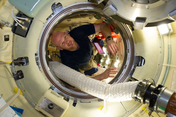 Flight Engineer Alexander Gerst is pictured in the Rassvet Mini-Research Module 1 hatch of the International Space Station. Image Credit: NASA Flight Engineer Alexander Gerst is pictured in the Rassvet Mini-Research Module 1 hatch of the International Space Station. Image Credit: NASA