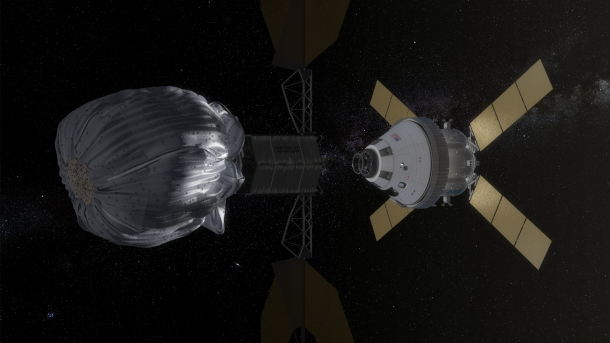 This conceptual image shows NASA’s Orion spacecraft (right) approaching the robotic asteroid capture vehicle, which has an asteroid in its capture bag (left). Image Credit: NASA This conceptual image shows NASA’s Orion spacecraft (right) approaching the robotic asteroid capture vehicle, which has an asteroid in its capture bag (left). Image Credit: NASA