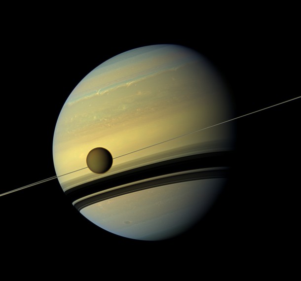 This Cassini image from 2012 shows Titan and its parent planet Saturn. Image Credit: NASA/JPL-Caltech/SSI This Cassini image from 2012 shows Titan and its parent planet Saturn. Image Credit: NASA/JPL-Caltech/SSI