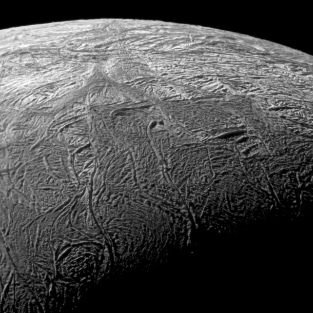 This is a close-up view of the fractures on Enceladus taken by Cassini during its flyby Nov. 21, 2009. The area, about 504 kilometers (313 miles) across, focuses on Baghdad Sulcus, a fracture in the south polar region. Image Credit: NASA/JPL/SSI This is a close-up view of the fractures on Enceladus taken by Cassini during its flyby Nov. 21, 2009. The area, about 504 kilometers (313 miles) across, focuses on Baghdad Sulcus, a fracture in the south polar region. Image Credit: NASA/JPL/SSI