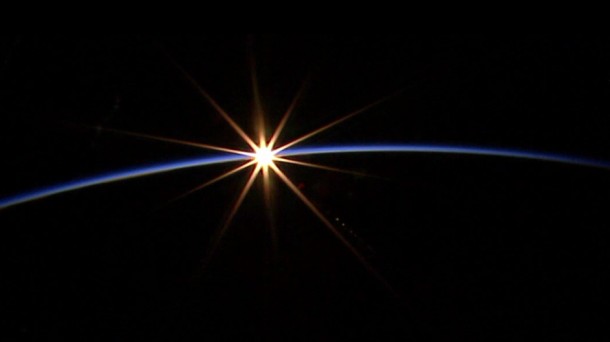 A sunrise is seen from the International Space Station a few minutes before the beginning of Thursday's spacewalk. Image Credit: NASA TV A sunrise is seen from the International Space Station a few minutes before the beginning of Thursday's spacewalk. Image Credit: NASA TV