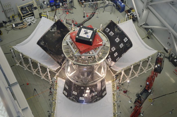 The three panels or fairings encapsulating a stand-in for Orion’s service module successfully detach and fall into the Fairing Catch System during a test Nov. 6, 2013 at Lockheed Martin’s facility in Sunnyvale, Calif. Image Credit: Lockheed Martin The three panels or fairings encapsulating a stand-in for Orion’s service module successfully detach and fall into the Fairing Catch System during a test Nov. 6, 2013 at Lockheed Martin’s facility in Sunnyvale, Calif. Image Credit: Lockheed Martin
