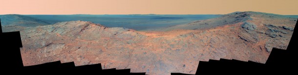 This May 14, 2014, scene from the Pancam on NASA's Mars Exploration Rover Opportunity catches "Pillinger Point," on the western rim of Endeavour Crater, in the foreground and the crater's eastern rim on the horizon. The scene's false color makes differences in surface materials more easily visible. Image Credit: NASA/JPL-Caltech/Cornell Univ./Arizona State Univ. This May 14, 2014, scene from the Pancam on NASA's Mars Exploration Rover Opportunity catches "Pillinger Point," on the western rim of Endeavour Crater, in the foreground and the crater's eastern rim on the horizon. The scene's false color makes differences in surface materials more easily visible. Image Credit: NASA/JPL-Caltech/Cornell Univ./Arizona State Univ.