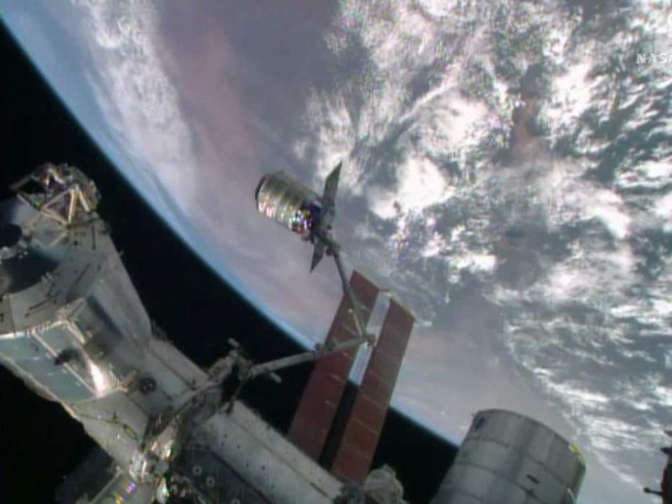 The International Space Station's robotic arm, Canadarm2, grapples the Orbital Sciences' Cygnus cargo craft Image Credit: NASA TV The International Space Station's robotic arm, Canadarm2, grapples the Orbital Sciences' Cygnus cargo craft Image Credit: NASA TV