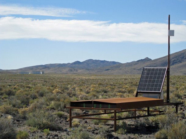 This solar-powered, table-like scintillation detector at the Telescope Array cosmic ray observatory measures the strength and direction of “air shower” particles that fall to Earth after incoming cosmic ray particles hit gas molecules in the atmosphere. In a major experiment, 507 of the observatory’s 523 scintillation detectors – spread out over 300 square miles of Utah desert – were used to find a “hotspot” in the northern sky that is emitting a greater-than-expected number of ultrahigh-energy cosmic rays. Such cosmic rays are the most energetic particles in the universe, and physicists are trying to determine their source or sources. Photo Credit: John Matthews, University of Utah This solar-powered, table-like scintillation detector at the Telescope Array cosmic ray observatory measures the strength and direction of “air shower” particles that fall to Earth after incoming cosmic ray particles hit gas molecules in the atmosphere. In a major experiment, 507 of the observatory’s 523 scintillation detectors – spread out over 300 square miles of Utah desert – were used to find a “hotspot” in the northern sky that is emitting a greater-than-expected number of ultrahigh-energy cosmic rays. Such cosmic rays are the most energetic particles in the universe, and physicists are trying to determine their source or sources. Photo Credit: John Matthews, University of Utah