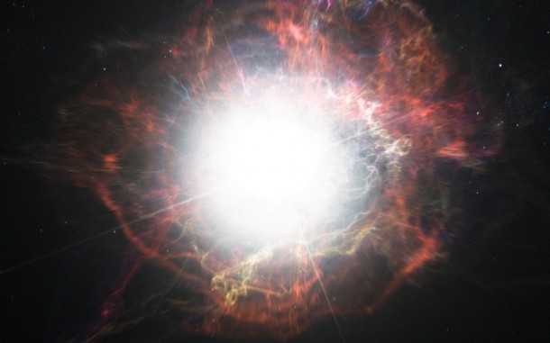 This artist’s impression shows dust forming in the environment around a supernova explosion. VLT observations have shown that these cosmic dust factories make their grains in a two-stage process, starting soon after the explosion, but continuing long afterwards. Credit: ESO/M. Kornmesser This artist’s impression shows dust forming in the environment around a supernova explosion. VLT observations have shown that these cosmic dust factories make their grains in a two-stage process, starting soon after the explosion, but continuing long afterwards. Credit: ESO/M. Kornmesser