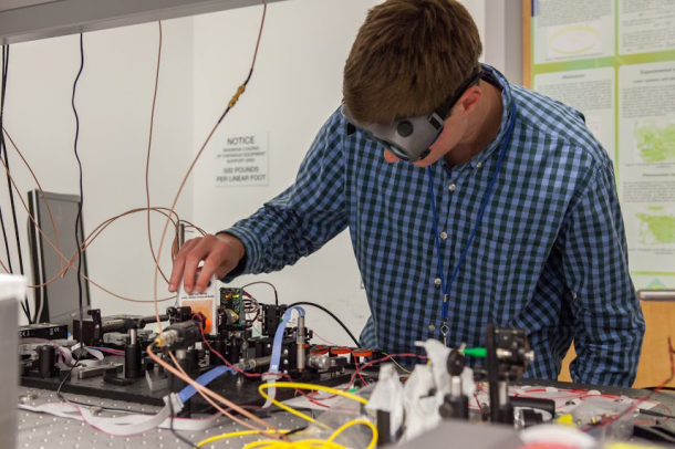 NASA Goddard intern Hudson Loughlin calibrates the equipment to be used for eLISA. Image Credit: NASA Goddard/Kristen Basham NASA Goddard intern Hudson Loughlin calibrates the equipment to be used for eLISA. Image Credit: NASA Goddard/Kristen Basham