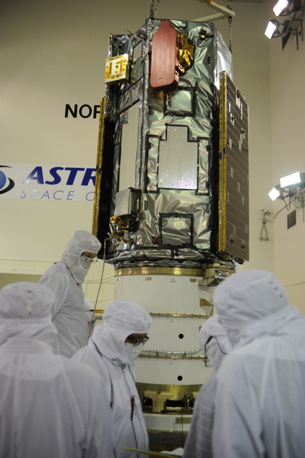 Technicians and engineers work with the OCO-2 spacecraft during processing inside a facility at Vandenberg Air Force Base in California. Image Credit: NASA/Air Force 30th Space Wing Technicians and engineers work with the OCO-2 spacecraft during processing inside a facility at Vandenberg Air Force Base in California. Image Credit: NASA/Air Force 30th Space Wing