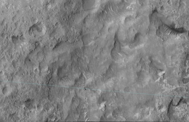 This June 27, 2014, image from the HiRISE camera on NASA's Mars Reconnaissance Orbiter shows NASA's Curiosity Mars rover on the rover's landing-ellipse boundary, which is superimposed on the image. The 12-mile-wide ellipse was mapped as safe terrain for its 2012 landing inside Gale Crater. Image Credit: NASA/JPL-Caltech/Univ. of Arizona This June 27, 2014, image from the HiRISE camera on NASA's Mars Reconnaissance Orbiter shows NASA's Curiosity Mars rover on the rover's landing-ellipse boundary, which is superimposed on the image. The 12-mile-wide ellipse was mapped as safe terrain for its 2012 landing inside Gale Crater. Image Credit: NASA/JPL-Caltech/Univ. of Arizona