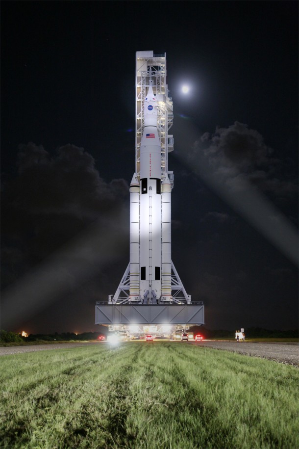 This artist concept shows NASA’s Space Launch System, or SLS, rolling to a launchpad at Kennedy Space Center at night. SLS will be the most powerful rocket in history, and the flexible, evolvable design of this advanced, heavy-lift launch vehicle will meet a variety of crew and cargo mission needs. Image Credit: NASA/MSFC This artist concept shows NASA’s Space Launch System, or SLS, rolling to a launchpad at Kennedy Space Center at night. SLS will be the most powerful rocket in history, and the flexible, evolvable design of this advanced, heavy-lift launch vehicle will meet a variety of crew and cargo mission needs. Image Credit: NASA/MSFC