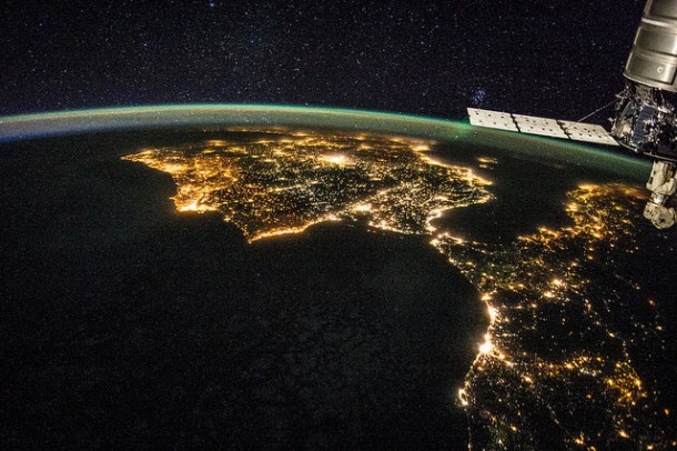 The Iberian Peninsula, part of northern Africa and the Cygnus cargo carrier are pictured from the space station. The Iberian Peninsula, part of northern Africa and the Cygnus cargo carrier are pictured from the space station.