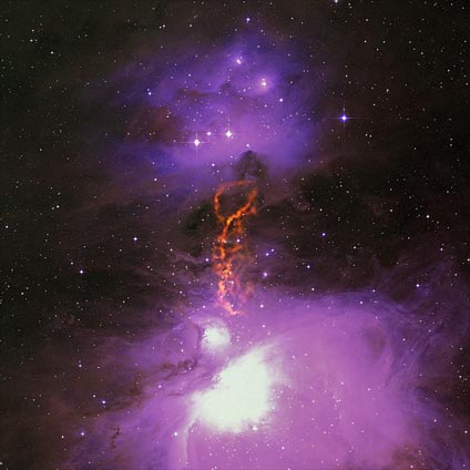 Radio/optical composite of the Orion Molecular Cloud Complex showing the OMC-2/3 star-forming filament. GBT data is shown in orange. Uncommonly large dust grains there may kick-start planet formation. Credit: S. Schnee, et al.; B. Saxton, B. Kent (NRAO/AUI/NSF); We acknowledge the use of NASA's SkyView Facility located at NASA Goddard Space Flight Center. Radio/optical composite of the Orion Molecular Cloud Complex showing the OMC-2/3 star-forming filament. GBT data is shown in orange. Uncommonly large dust grains there may kick-start planet formation. Credit: S. Schnee, et al.; B. Saxton, B. Kent (NRAO/AUI/NSF); We acknowledge the use of NASA's SkyView Facility located at NASA Goddard Space Flight Center.