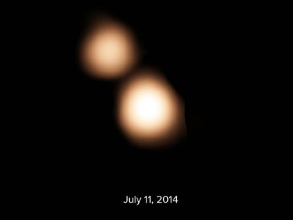 Animated image of ALMA data showing the motion of the moon Charon around the icy dwarf planet Pluto. Credit: B. Saxton (NRAO/AUI/NSF) Animated image of ALMA data showing the motion of the moon Charon around the icy dwarf planet Pluto. Credit: B. Saxton (NRAO/AUI/NSF)