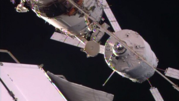 The Automated Transfer Vehicle holds for checks just a few feet away from docking to the Zvezda service module. Image Credit: NASA TV The Automated Transfer Vehicle holds for checks just a few feet away from docking to the Zvezda service module. Image Credit: NASA TV